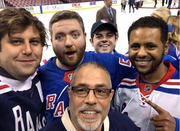 Ryan Breslin taking picture with his friends.